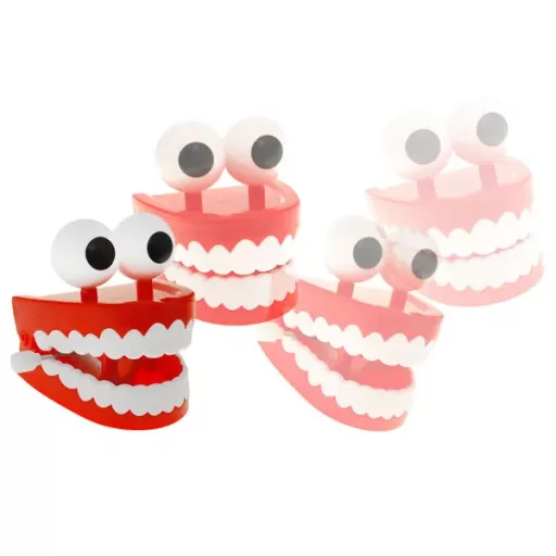 Felhúzható kattogó műfogsor nagy szemekkel, vicces játék 6,5 cm