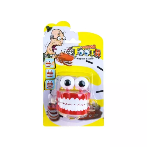 Felhúzható kattogó műfogsor nagy szemekkel, vicces játék 6,5 cm