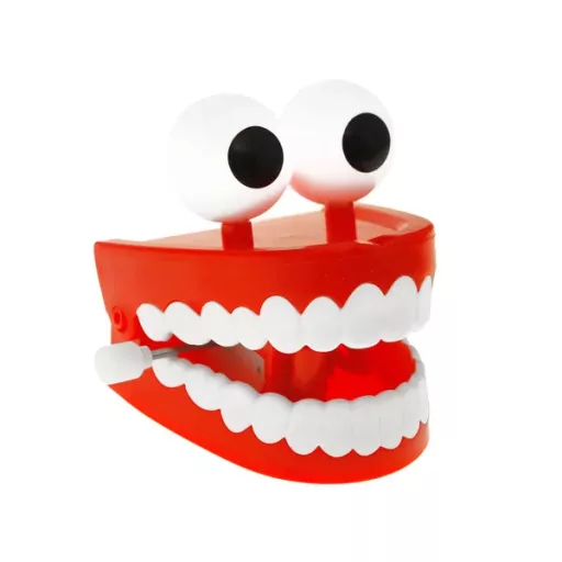 Felhúzható kattogó műfogsor nagy szemekkel, vicces játék 6,5 cm