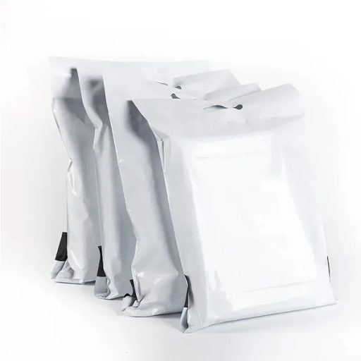 Fehér futár fóliatasak fogantyúval 500×600+70 mm, 50 db/csomag