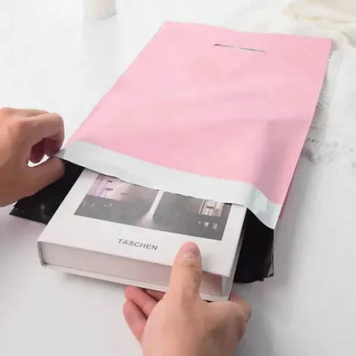 Rózsaszín LDPE futártasak fogantyúval 500×600+70 mm, 50 db